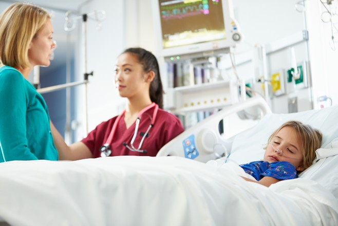 Sleeping child in ICU bed