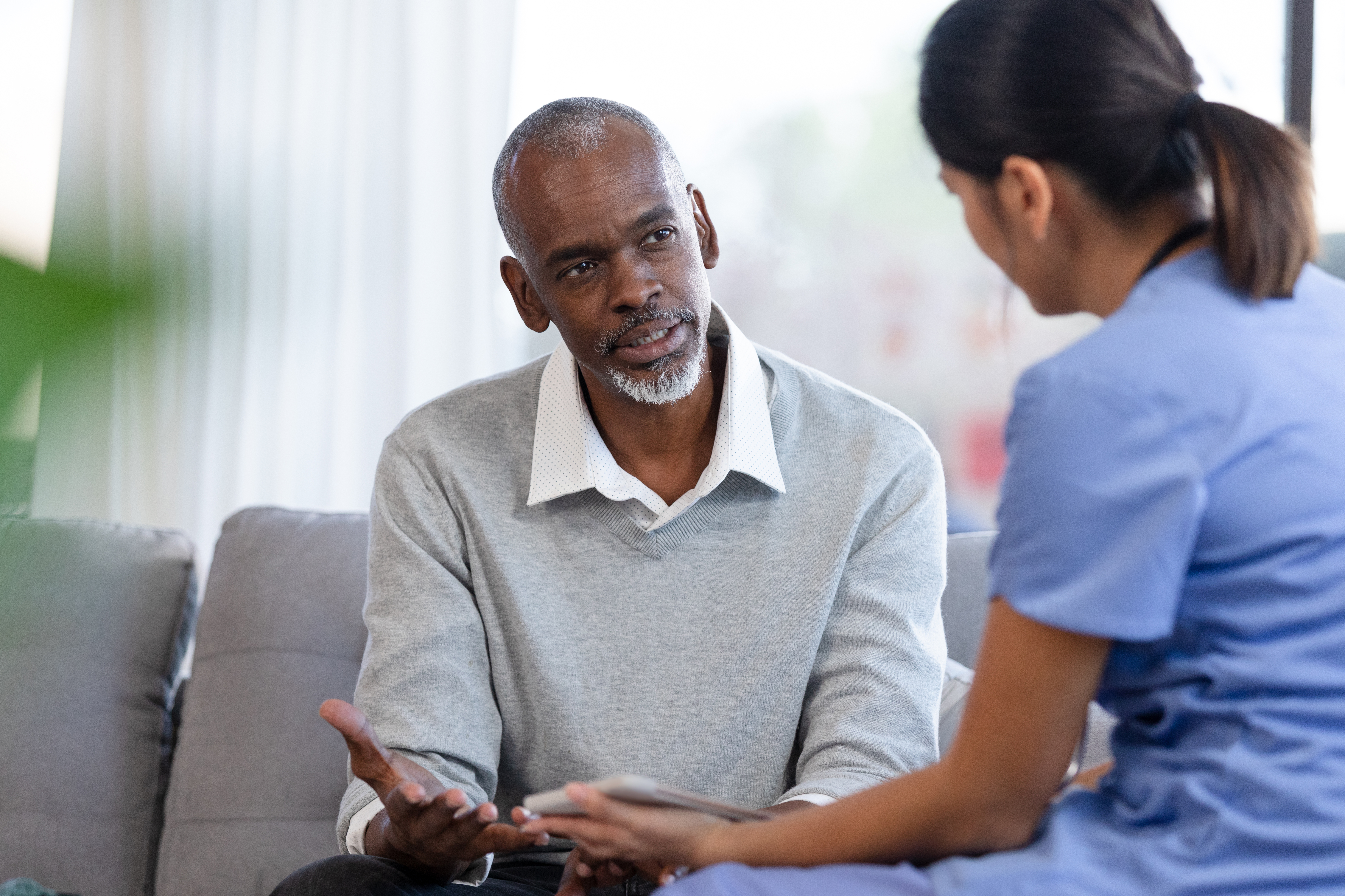 Active listening Nurse listening to patient